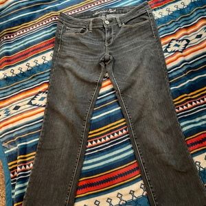 American eagle jeans size 10 they have been Hemmed but they go to my ankles?